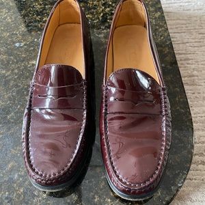 Tod’s.  Made in Italy patent leather shoes